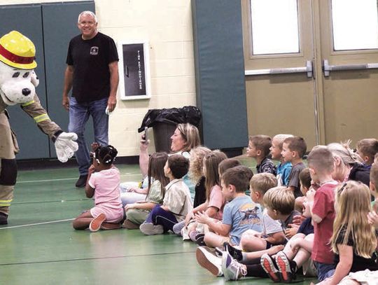 Local firefighters visit schools to teach fire safety