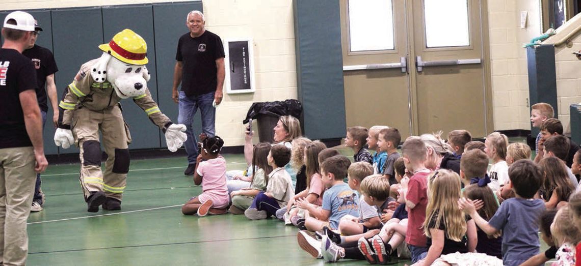 Local firefighters visit schools to teach fire safety Local firefighters visit schools to teach fire safety